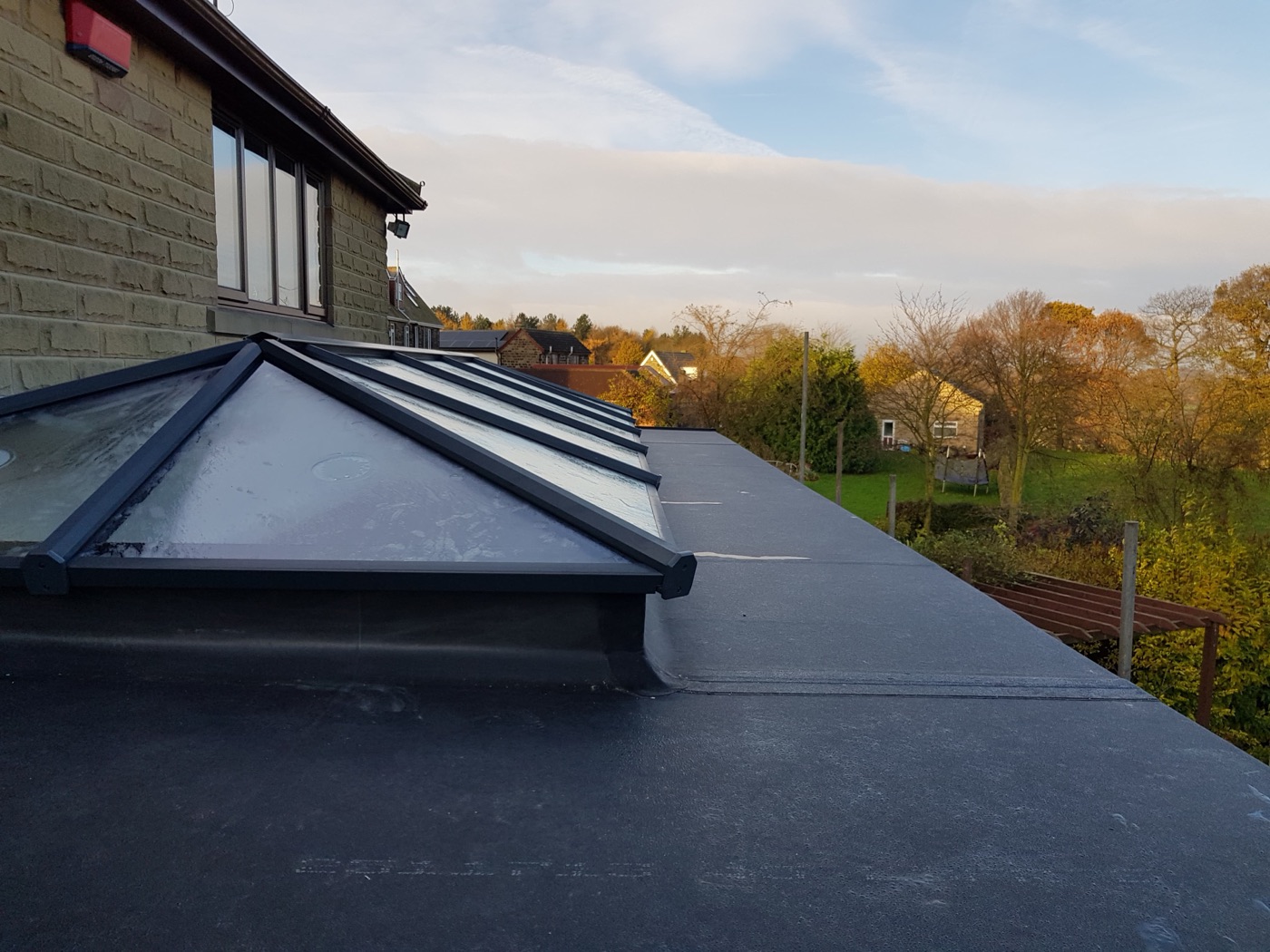 New flat roof with a glazed roof lantern